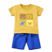 Little Minors boys' animal story summer set includes a cotton T-shirt with animal prints and matching shorts.