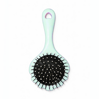Little Minors baby hair brush with soft bristles and gentle scalp comb for kids' grooming and hair care.