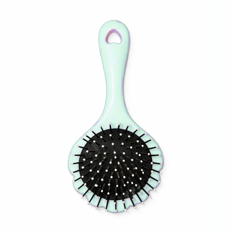 Little Minors baby hair brush with soft bristles and gentle scalp comb for kids' grooming and hair care.