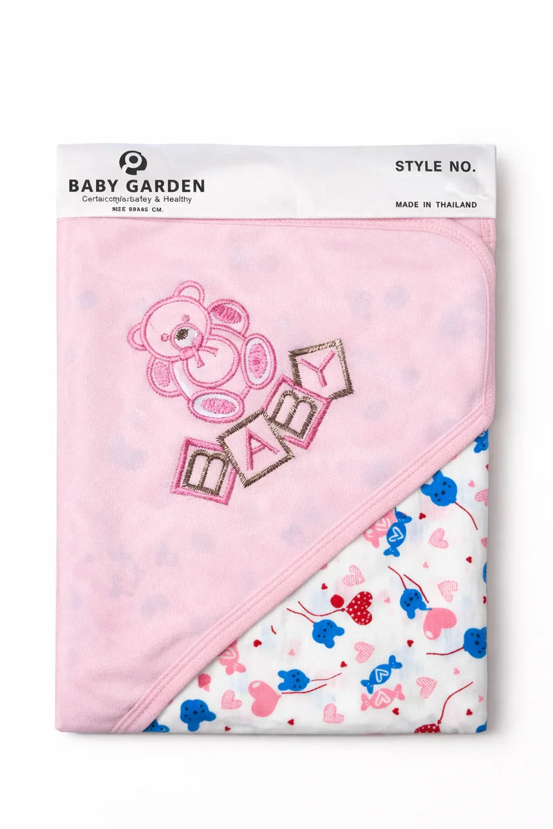 Soft white baby hooded towel with "BABY" embroidery from Little Minors, made of cotton, featuring a cozy hood and bath wrap design.