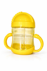 Yellow baby sippy cup with dual handles and a spill-proof lid on white background